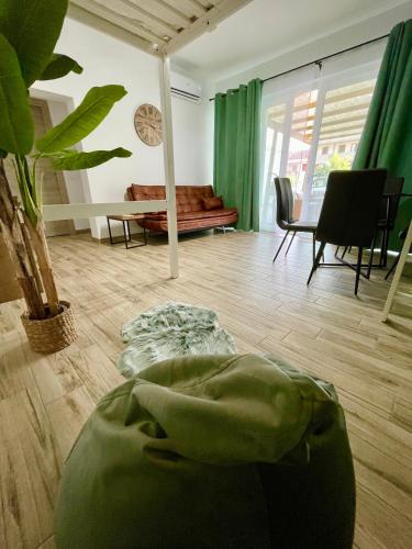 Coin salon dans l'établissement Green House Verona - Appartamento Comfort
