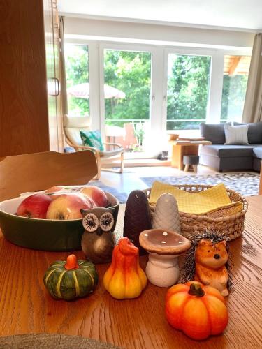 a group of pumpkins and other items on a table at FeWo Fuchs Saig in Lenzkirch