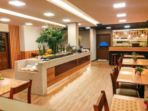 Restoran atau tempat lain untuk makan di Presto Hotel