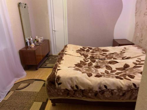 Ein Bett oder Betten in einem Zimmer der Unterkunft Guest house Mzia