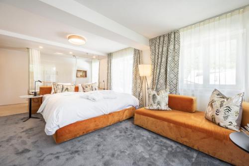 Postel nebo postele na pokoji v ubytování Hotel Christina