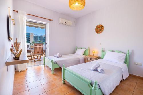 Postel nebo postele na pokoji v ubytování Bonendis - Sea View Apartment