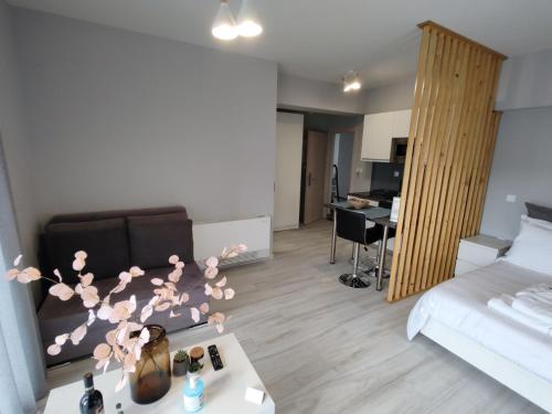 Una cama o camas en una habitación de DIFFERENT APARTMENTS