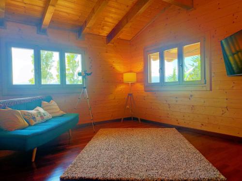 Гостиная зона в Chalet Collalto con Piscina