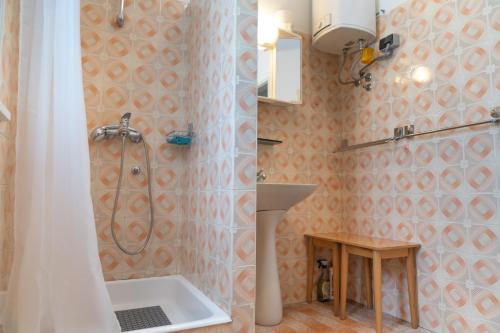 a bathroom with a shower and a sink at Sidus Maris in Martinšćica