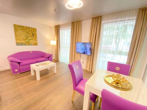 Televízia a/alebo spoločenská miestnosť v ubytovaní Steiner Residences Vienna Vorgartenstrasse