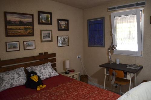 Cama ou camas em um quarto em MotoGP Accommodation