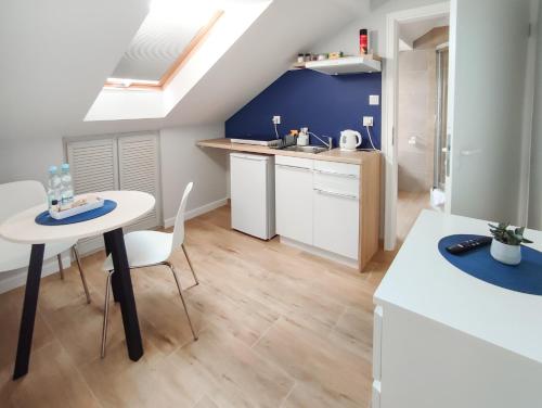 Una cocina o cocineta en Apart Hostel S8