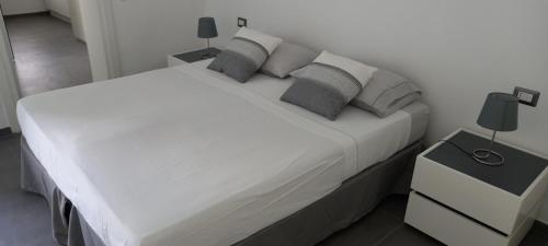Postel nebo postele na pokoji v ubytování La corte fra gli aranci - Capri