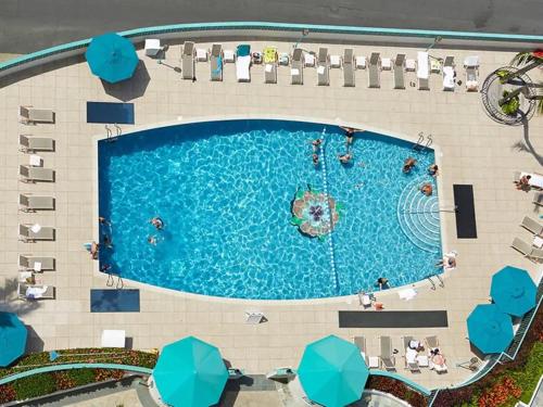 an overhead view of a swimming pool at a resort at Ilikai #1743 Panoramic views on Waikiki Beach in Honolulu