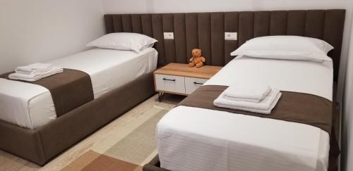 Ένα ή περισσότερα κρεβάτια σε δωμάτιο στο 2A New Bazaar Apartment