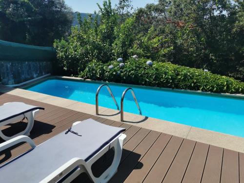 Kolam renang di atau dekat dengan Casa do Sapateiro - piscina