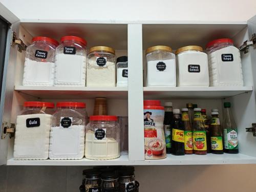 a refrigerator filled with lots of different types of food at HOMESTAY SYAABAN Kamunting Taiping Batu Kurau Ulu Sepetang in Kamunting