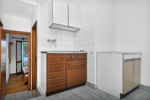 Kuchyň nebo kuchyňský kout v ubytování Apartment Pokrivenik 5231b