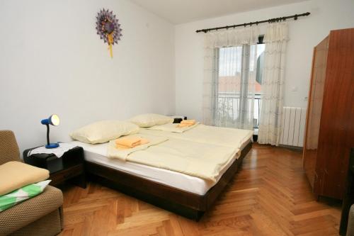 Postel nebo postele na pokoji v ubytování Apartments with a parking space Novi Vinodolski - 5514
