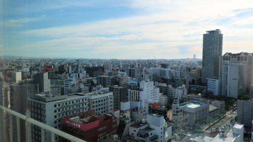 a view of a large city with tall buildings at Hotel Royal Classic Osaka in Osaka