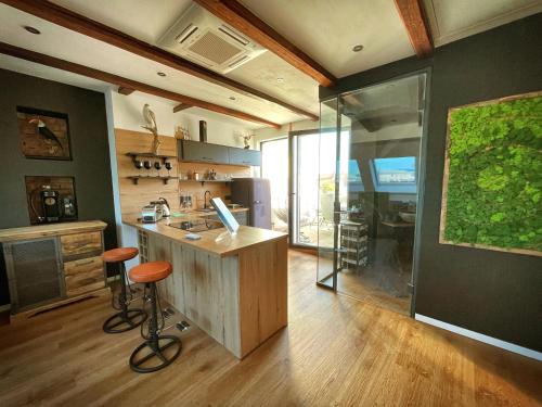 Kuchyň nebo kuchyňský kout v ubytování Studio Hundertwasser