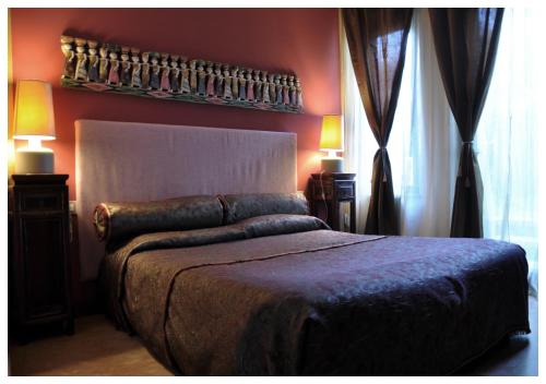 Voodi või voodid majutusasutuse Casa Magnani toas