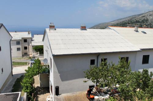 Apartments with a parking space Senj - 5577