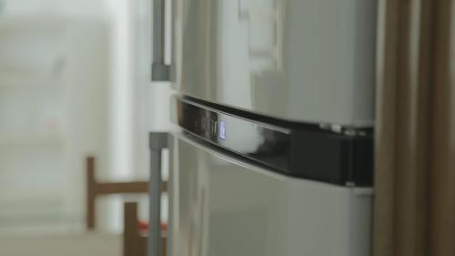 a microwave oven sitting on top of a refrigerator at Casa Stefano Lecce in Lecce