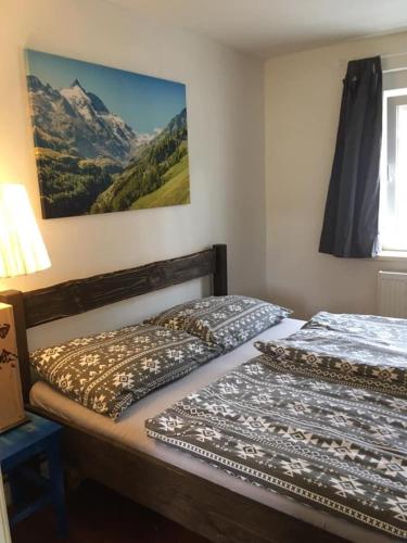 two beds sitting next to each other in a bedroom at Chalupa Magistrála in Horní Blatná