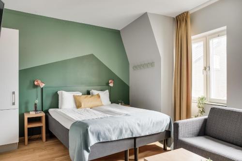 Postel nebo postele na pokoji v ubytování Forenom Aparthotel Lund