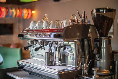 a coffee machine sitting on top of a counter at BIG MAMA Berlin in Berlin