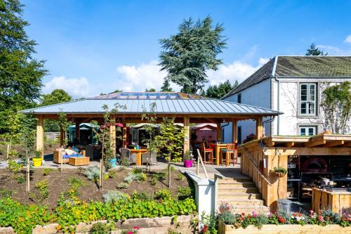 a house with a garden in front of it at Banchory Lodge Hotel in Banchory