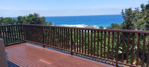 a balcony with a view of the ocean at On The Beach @ South Sands.No 2 in Port Edward