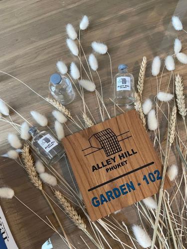 a bunch of grains of wheat and bottles of water at Alleyhill Phuket - Private & Cozy Boutique in Phuket Town