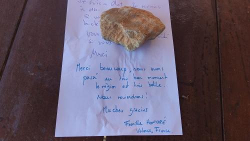 a piece of paper with a rock on it at Mas Ca La Coixa in Tortellá