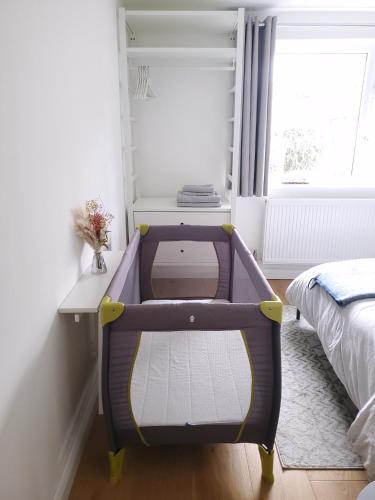 a small room with a bed and a desk at Self-contained annexe excellent location in Saltdean