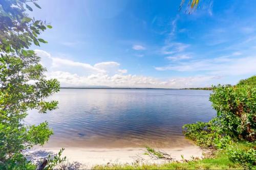 a view of a large body of water at Alterhome Swan villas with swimming pool and ocean views in Placencia Village