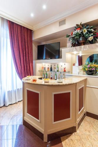 a kitchen with a island in a room at Hotel Garda in Milan