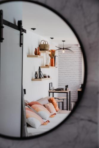 Ένα ή περισσότερα κρεβάτια σε δωμάτιο στο Quinze suites et wellness de luxe