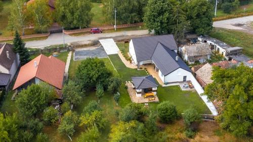 an overhead view of a house with a yard at Zlatne perle in Vrdnik