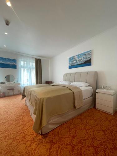 Letto o letti in una camera di ART HOTEL HOUSE ONE