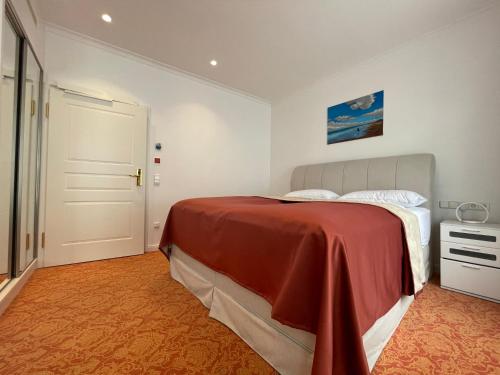 Letto o letti in una camera di ART HOTEL HOUSE ONE