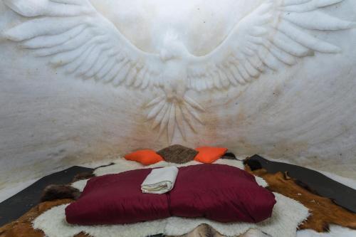 a wall with an angel painted on it at Village Igloo Les Arcs in Arc 2000