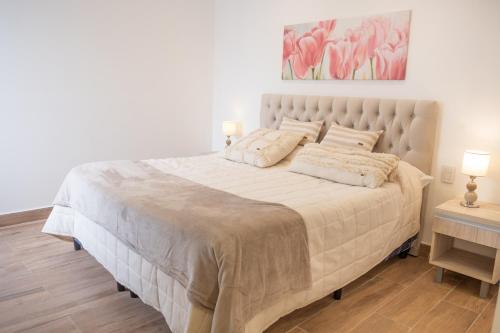 Postel nebo postele na pokoji v ubytování Augusta Deluxe