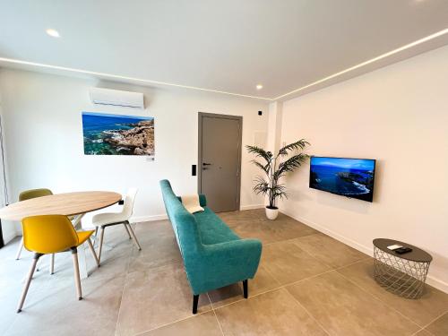 a dining room with a table and chairs at La Cala de Alcalá Luxury in Alcalá