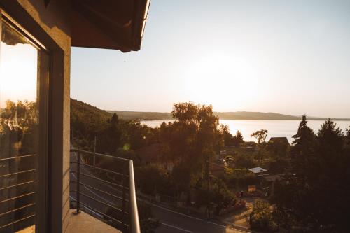 a view of the water from a balcony of a house at Horizont Dedine in Golubac