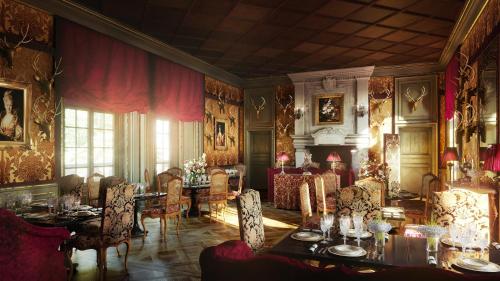 a dining room with tables and chairs and red curtains at Relais & Château Louise de La Vallière in Reugny