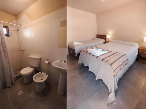 1 dormitorio con cama, aseo y lavamanos en El Caucillar en Iruya