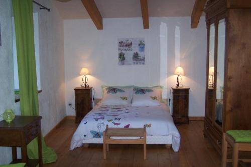 Postel nebo postele na pokoji v ubytování Salomony Chambre d'Hôtes