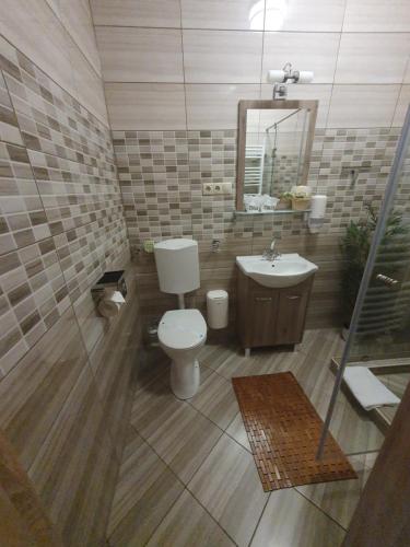 Ένα μπάνιο στο Harmony apartments