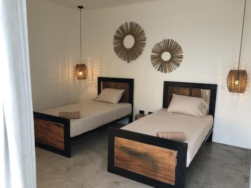 Katil atau katil-katil dalam bilik di LAOLA SURF CAMP EL SUNZAL