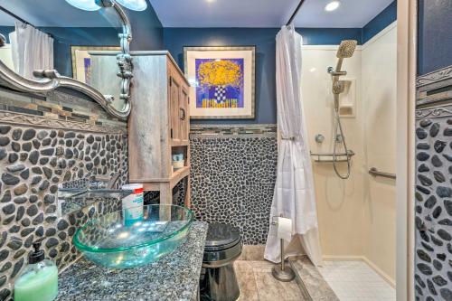 a bathroom with a sink and a shower at Spacious Memphis Home Less Than 3 Mi to Graceland! in Memphis
