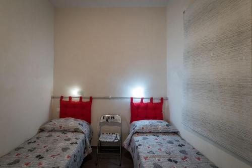 Postel nebo postele na pokoji v ubytování Casa vacanze "Ulivi nel Mare"
