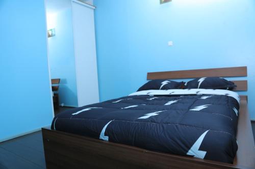 Postel nebo postele na pokoji v ubytování RugsResidence